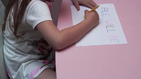 Child drawing 'all will be ok' and big yellow sun with felt-tip pens 스톡 동영상 279436308