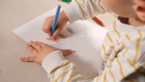 Child drawing hands Stock Footage 258485934