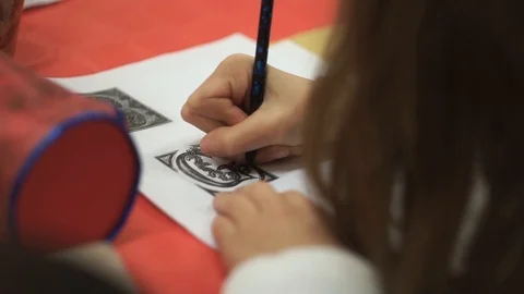 Child drawing at school close up Stock Footage 117365742