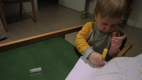 Child Drawing Yellow Marker Stock Footage 300903580