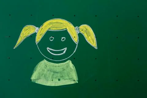 Child drawn with chalk on a blackboard learning method for individual work Stockfoto's