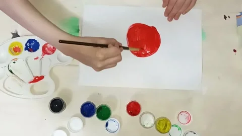 Child draws an apple Stock Footage 194339177