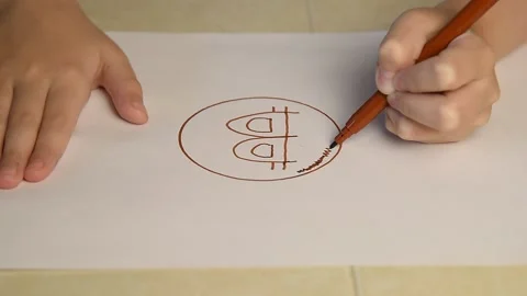 The child draws bitcoins, virtual electronic money. Stock Footage 145085210