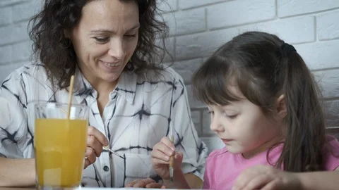 Child draws with mom. Stock Footage 102619150