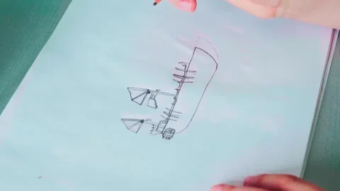 Child draws with pencil, erases lightly Stock Footage 342020457