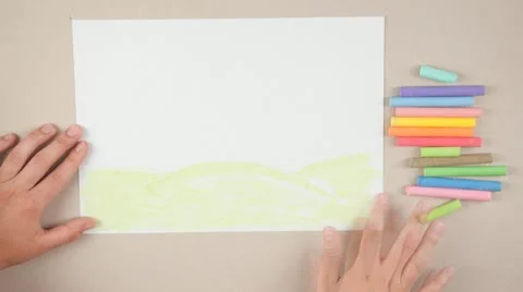 Child draws a picture with chalks Stock Footage 14954065