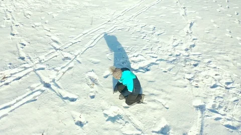 Child draws in the snow Stock Footage 120288853