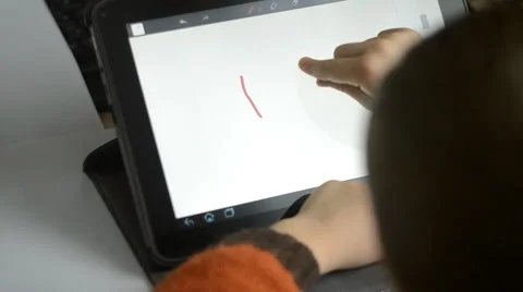 Child draws on the tablet Stock Footage 59662858