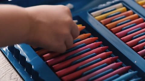The child draws with wax crayons Stock Footage 144534960