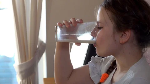 Child Drinking milk Stock Footage 97445198