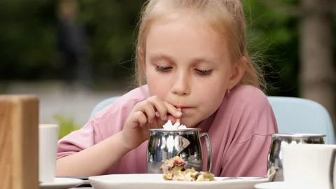 Child drinking milkshake, cafe Stock Footage 201488168