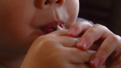 Child drinking from paper straw Stock Footage 104322521