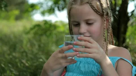 Child drinking water Stock Footage 21977926