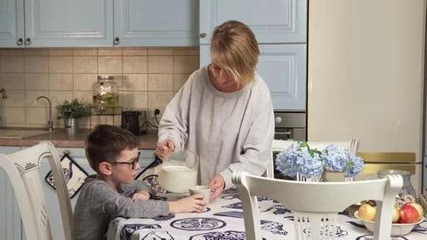 Child drinks milk Stock Footage 81258398