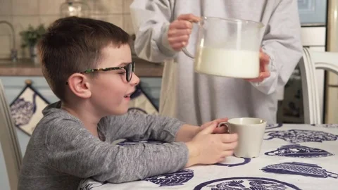 Child drinks milk Stock Footage 81258833