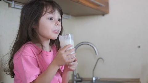 The child drinks milk. Stock-Footage 107547849