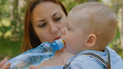The child drinks water Stock Footage 84990762