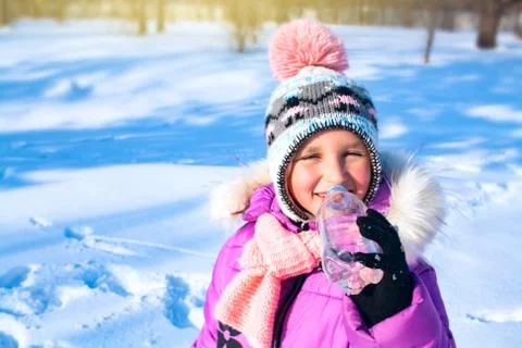 The child drinks water Stock Photos