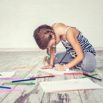 Child drowing at home Stock Photos