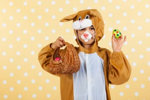Child as easter hare with eggs Stock Photos