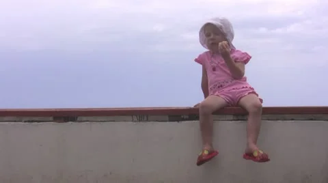 Child eat the orange fruit Stock Footage