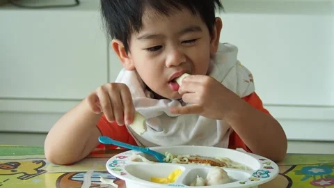 Child eating 1 Stock Footage 139180502