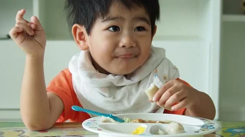 Child eating 2 Stock Footage 139179120