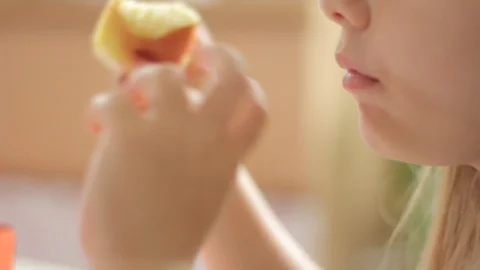 A Child Eating An Apple Stock Footage 110791244