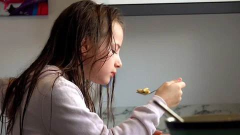 Child Eating Breakfast Video stock 97446899