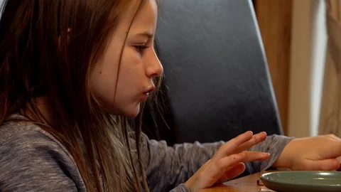 Child eating breakfast Stock Footage 98928547