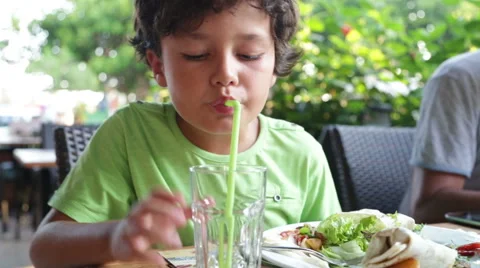 Child eating at the cafe 4 Stock Footage 41831871