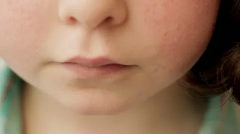 Child eating candy CU Stock Footage 12628759