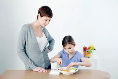 Child eating a meal Stock Photos