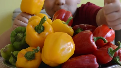 Child eating pepper Stock Footage 141375562
