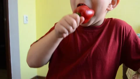 Child eating pepper Stock Footage 141376962