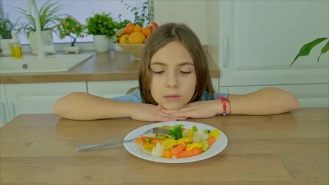 The child eats boiled vegetables. Selective focus. Stock Footage 169743046