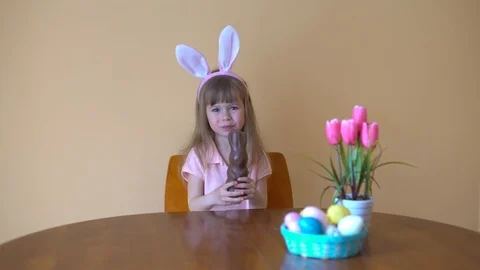 Child Eats A Chocolate Hare. Stock Footage 105090095