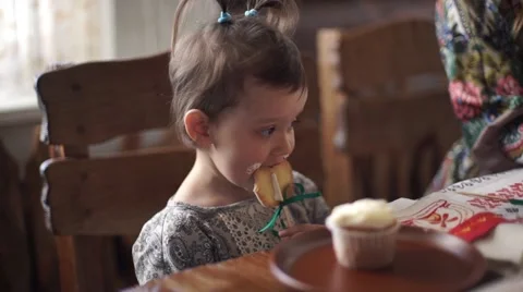 The child eats an Easter cake. Stock Footage 64816590