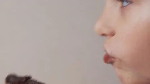 Child eats fried meat. Unhealthy food Stock Footage 168748631