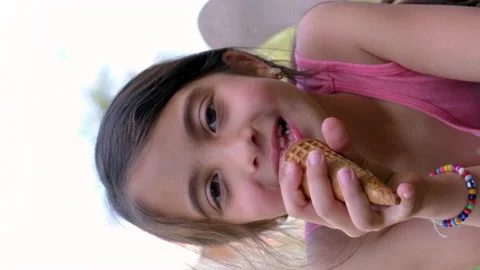 A child eats ice cream in the park. Selective focus. Stock Footage 202301607