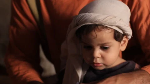 Child Eats Passover Dinner in Biblical Reenactment Stock Footage 51460413