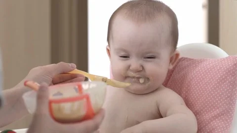The child eats porridge Stock Footage 75908868