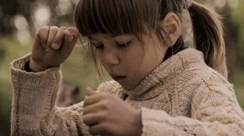 Child eats porridge spoon.Appetizing boy eats porridge Stock Footage 38044237