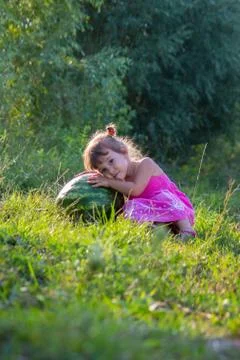 A child eats watermelon. Selective focus. nature. Stock Photos