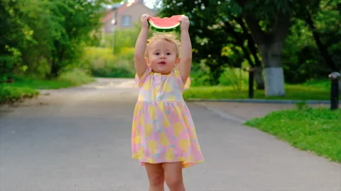 The child eats watermelon in summer. Selective focus. Stock Footage 205543304