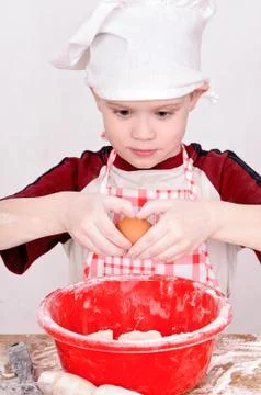 Child with egg Stock Photos