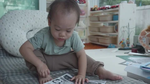 Child Engaged in Creative Drawing Activity Stock Footage 343556802