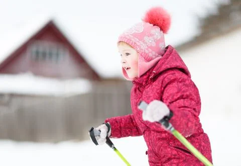 Child engaged on  skiing in the winter Stock Photos
