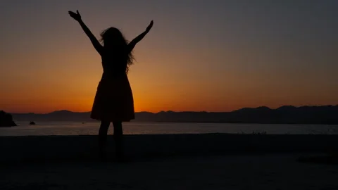 Child enjoy dusk sun with open hands Stock Footage 301623218