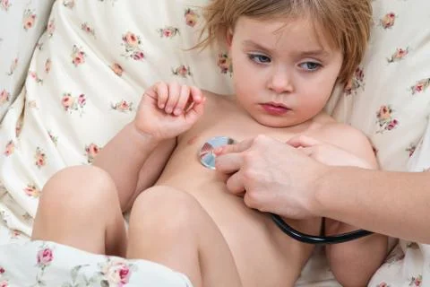 Child examined using stethoscope Stock Photos